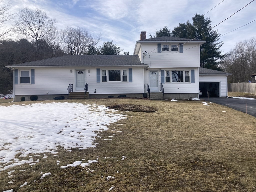17 Adams Road Grafton, MA 01519 - Photo 10 of 42 a house that has a big yard in front of it