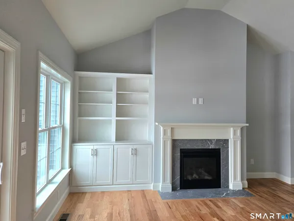 a living room with a fireplace