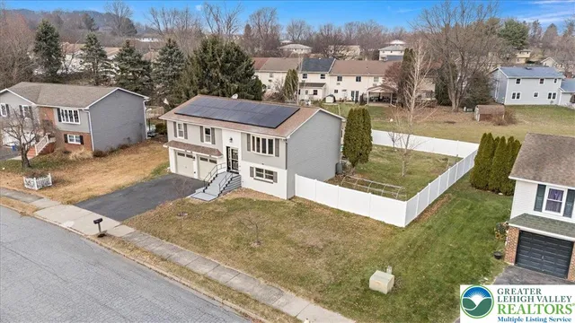 a view of a house with a swimming pool