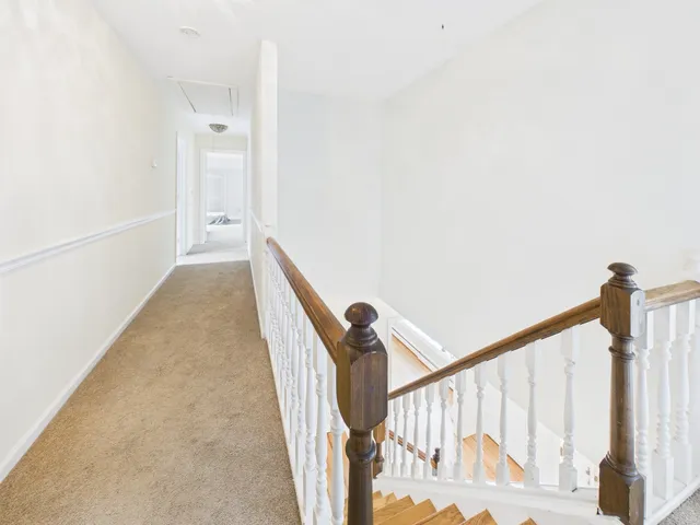 a view of a stairs and an entryway