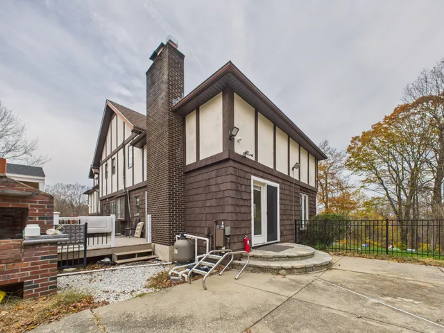 a front view of a house with yard