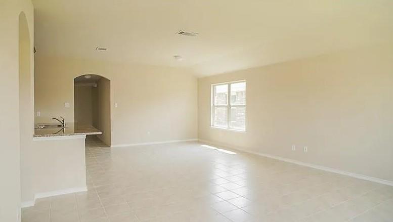 916 Opal Path Princeton, TX 75407 - Photo 4 of 9 an empty room with windows