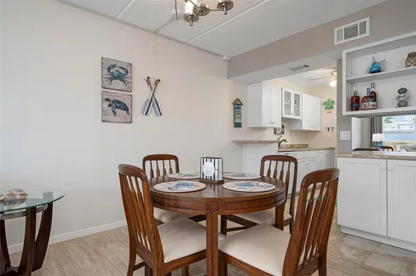 a view of a dining room with furniture