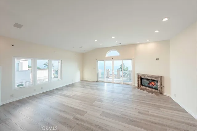 a bathroom with a granite countertop double vanity sink a mirror and a