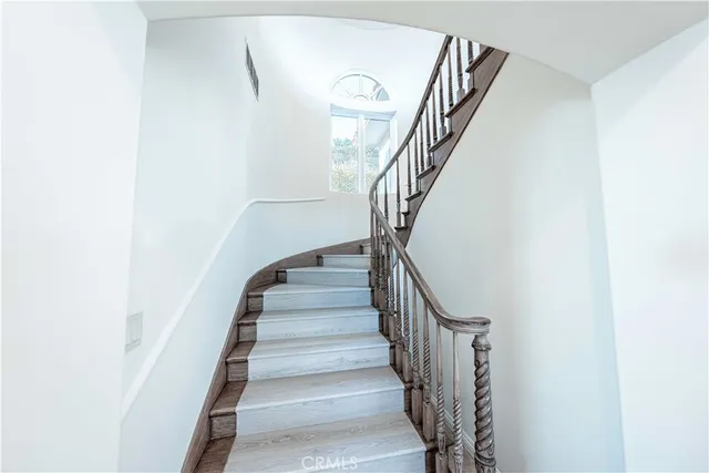 an aerial view of a house with swimming pool