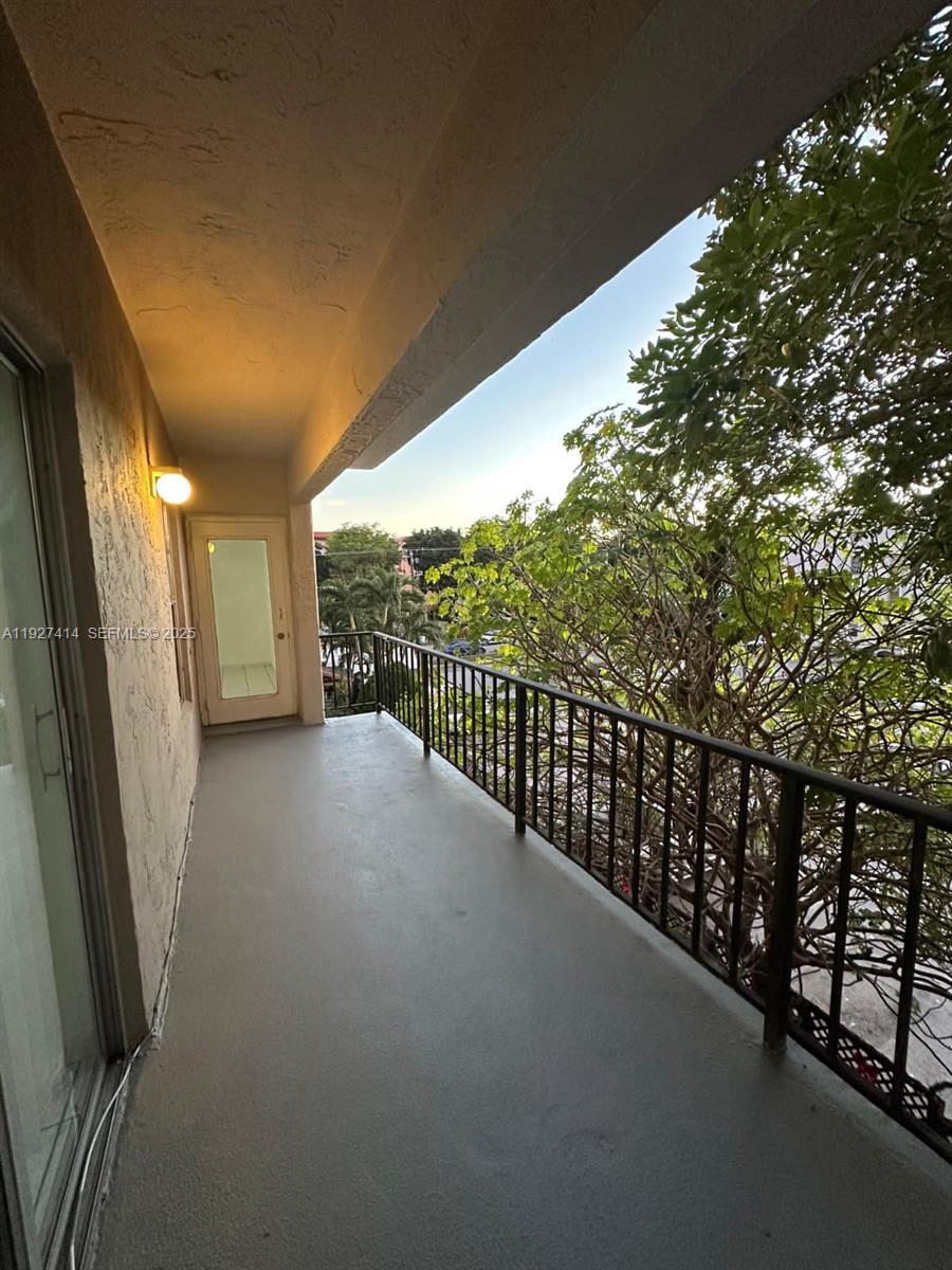 5665 West 20th Avenue, Unit 308 Hialeah, FL 33012 - Photo 16 of 17 a view of a balcony