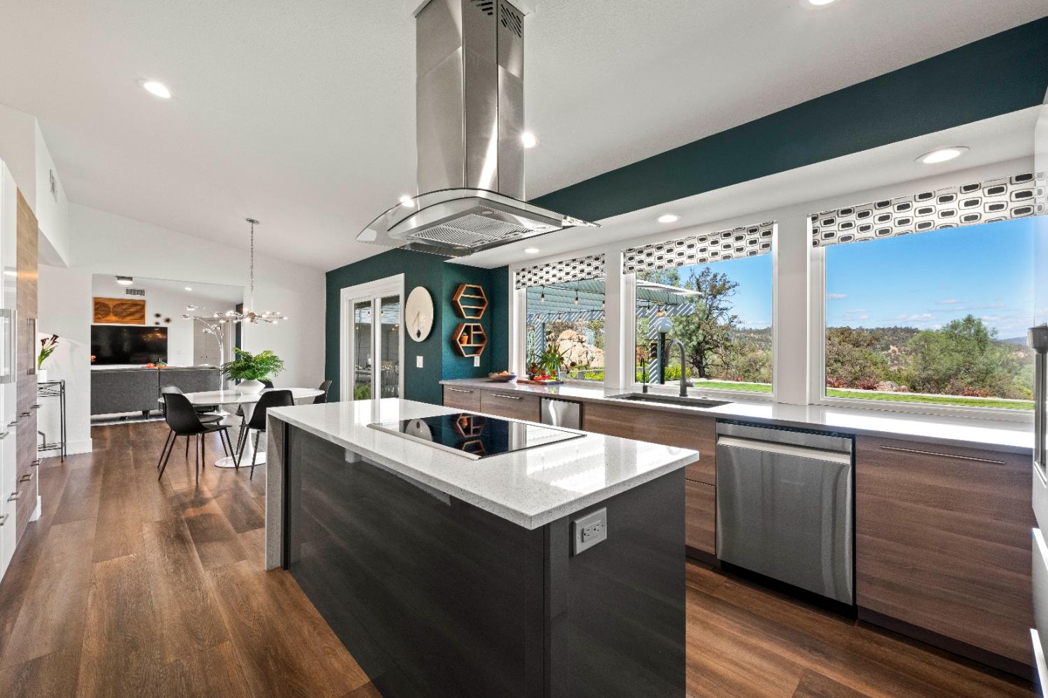 8155 Hubbard Road Auburn, CA 95602 - Photo 20 of 74 a kitchen with stainless steel appliances granite countertop a sink and wooden floors