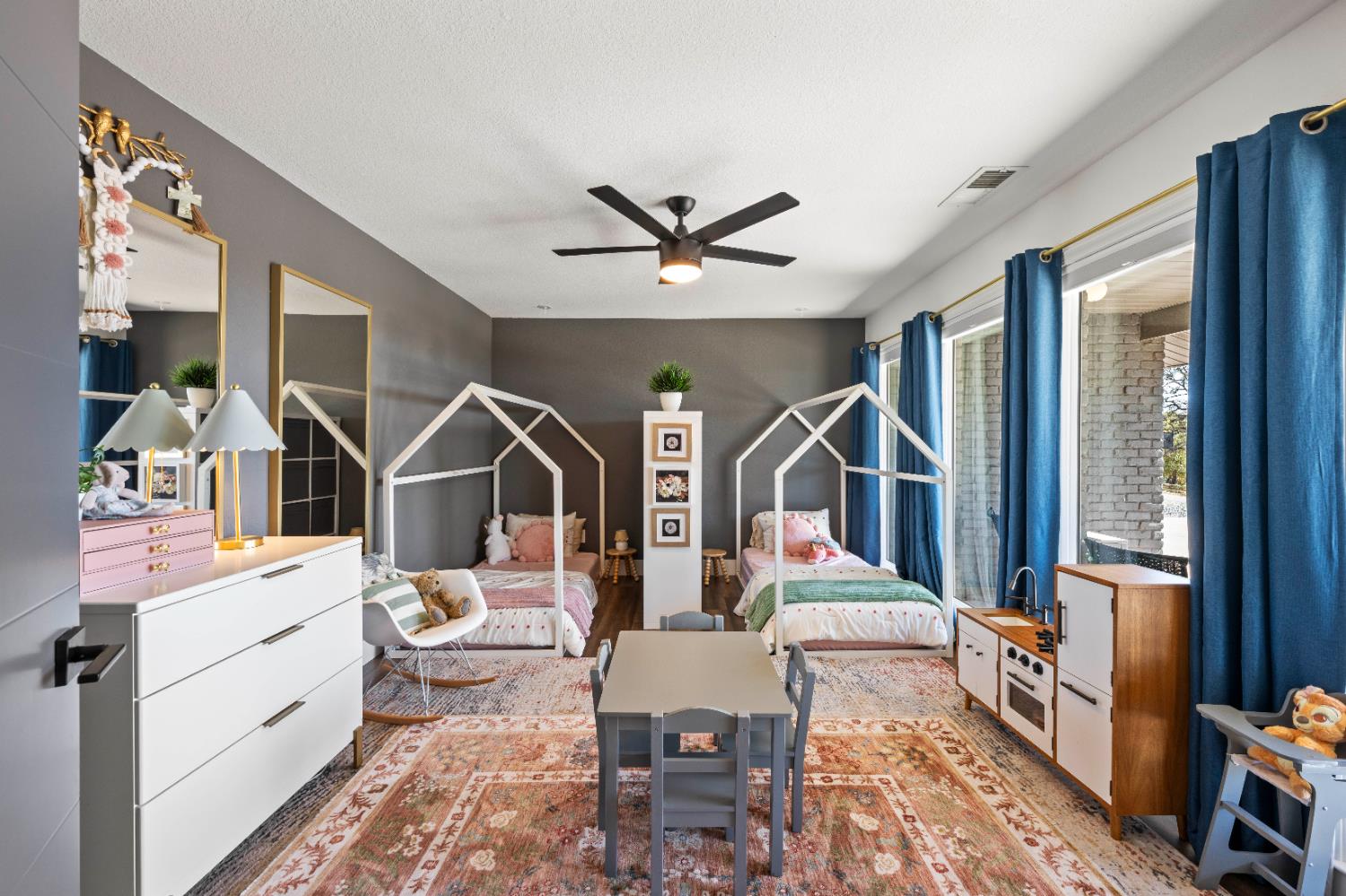 8155 Hubbard Road Auburn, CA 95602 - Photo 23 of 74 a living room with furniture a rug and a chandelier