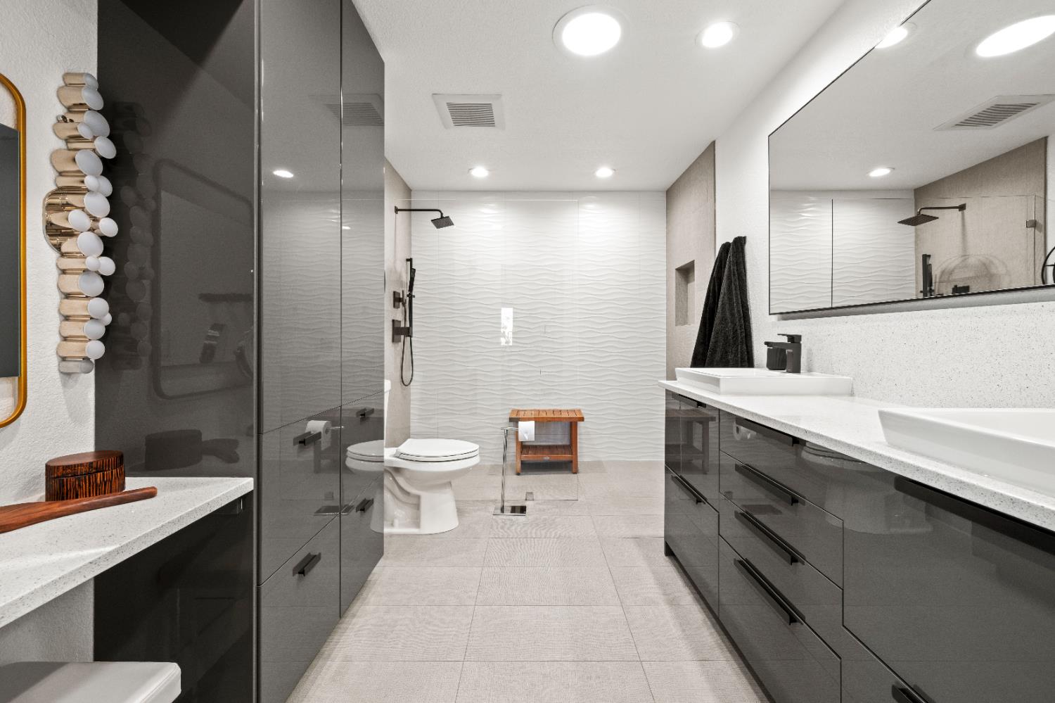 8155 Hubbard Road Auburn, CA 95602 - Photo 34 of 74 a bathroom with a double vanity sink toilet and shower