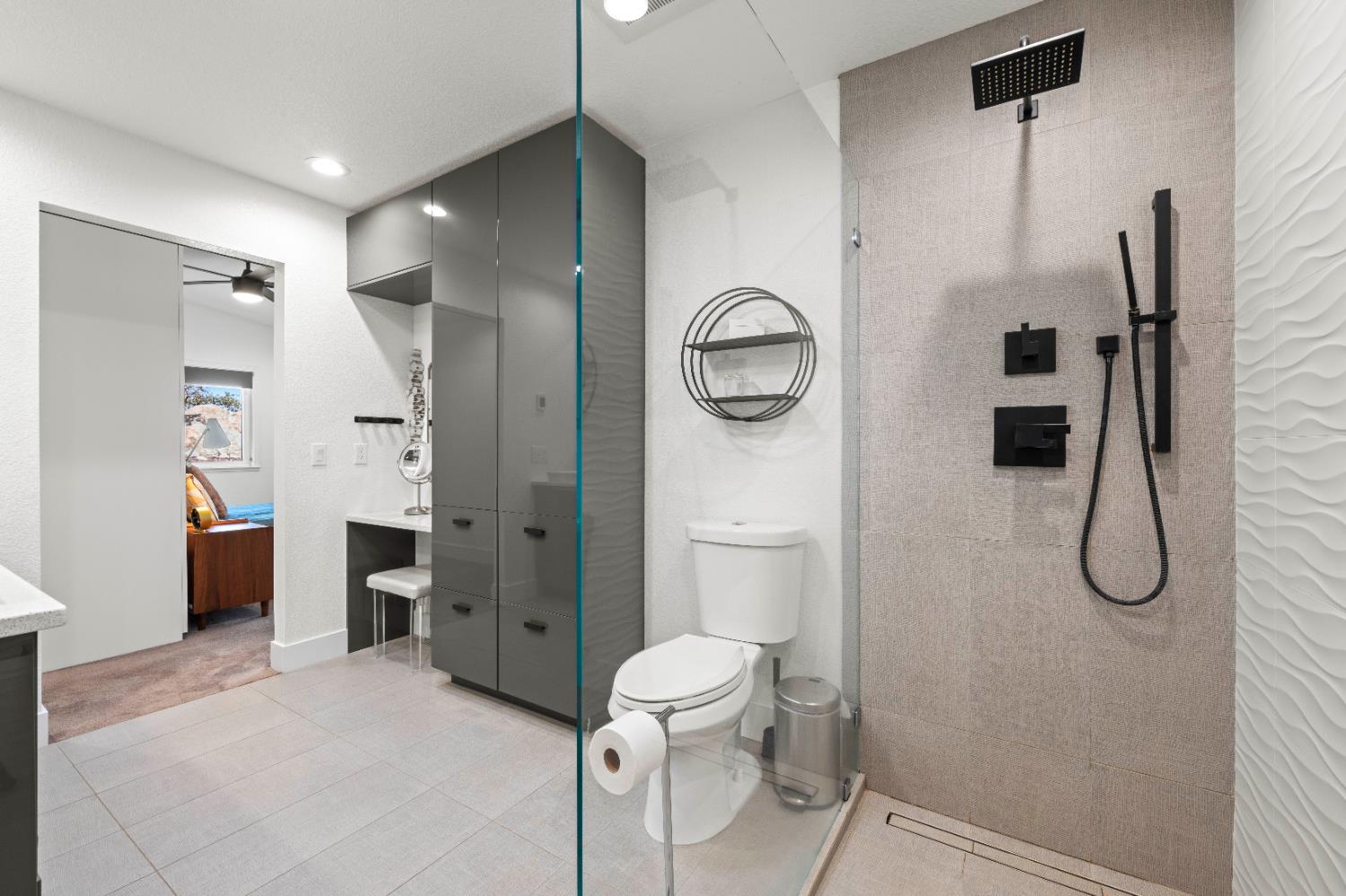 8155 Hubbard Road Auburn, CA 95602 - Photo 36 of 74 a bathroom with a toilet and a shower