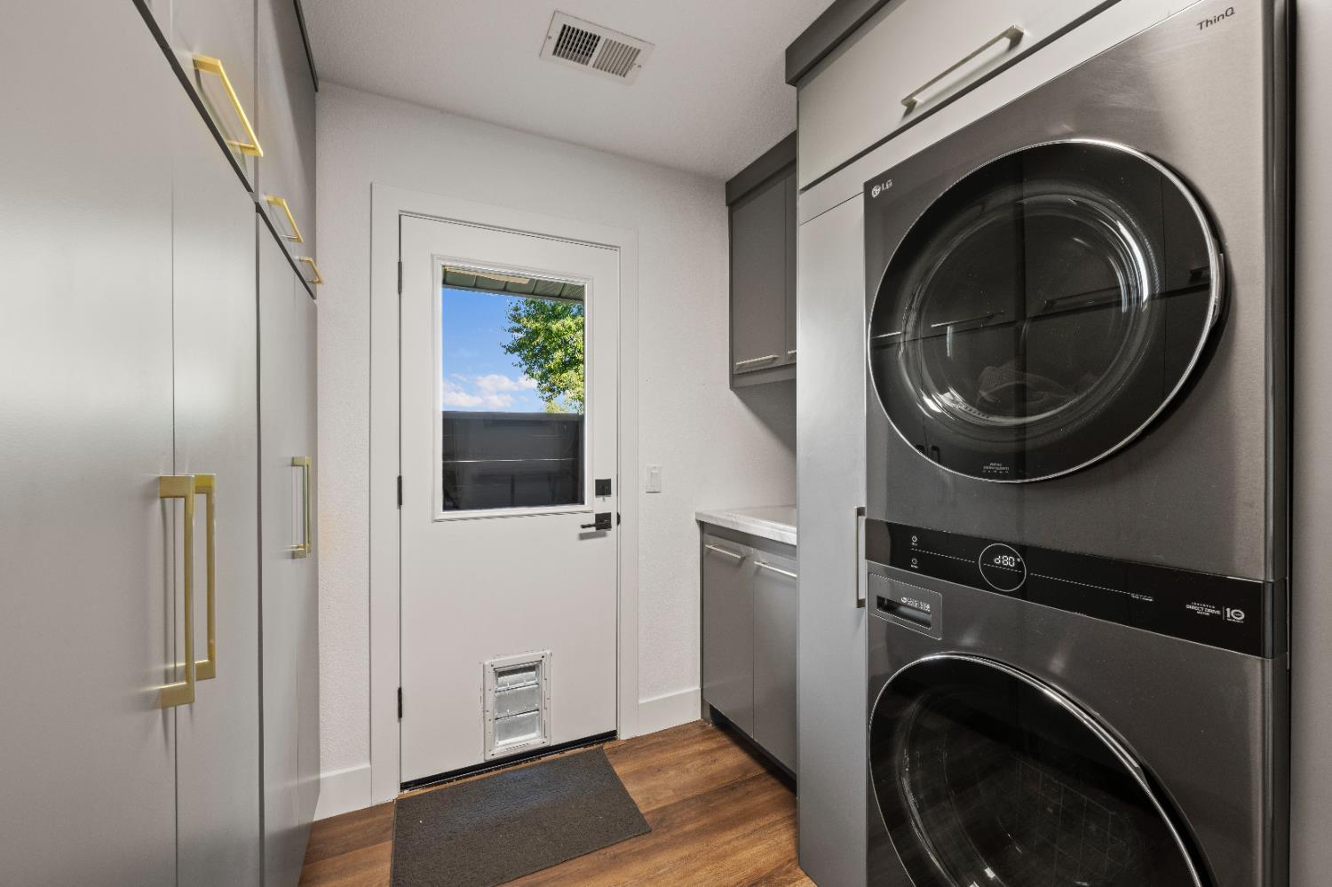8155 Hubbard Road Auburn, CA 95602 - Photo 37 of 74 a view of a hallway with washer and dryer