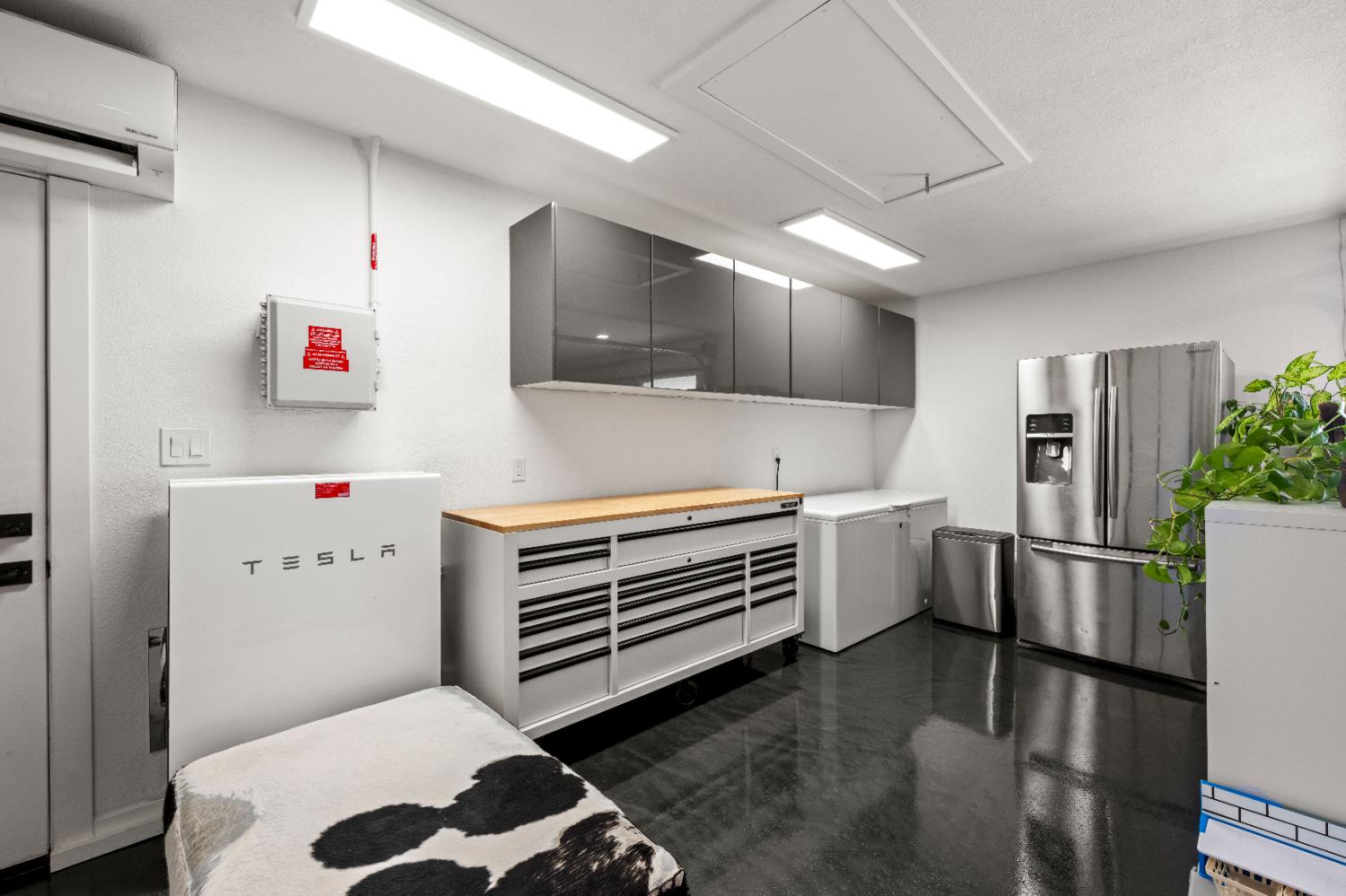 8155 Hubbard Road Auburn, CA 95602 - Photo 43 of 74 a utility room with cabinets washer and dryer