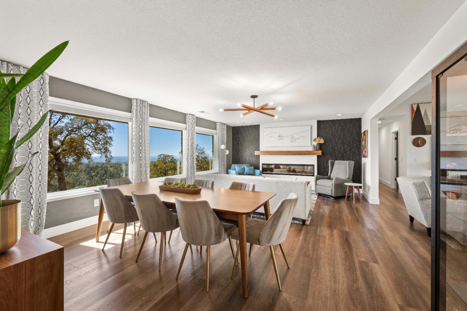 8155 Hubbard Road Auburn, CA 95602 - Photo 5 of 74 a view of a dining room with furniture large window and wooden floor