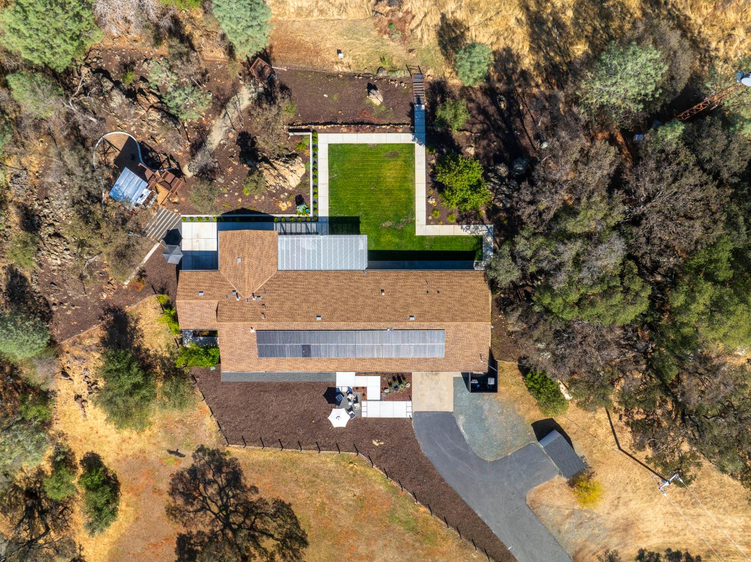 8155 Hubbard Road Auburn, CA 95602 - Photo 55 of 74 an aerial view of a house with a yard basket ball court and outdoor seating