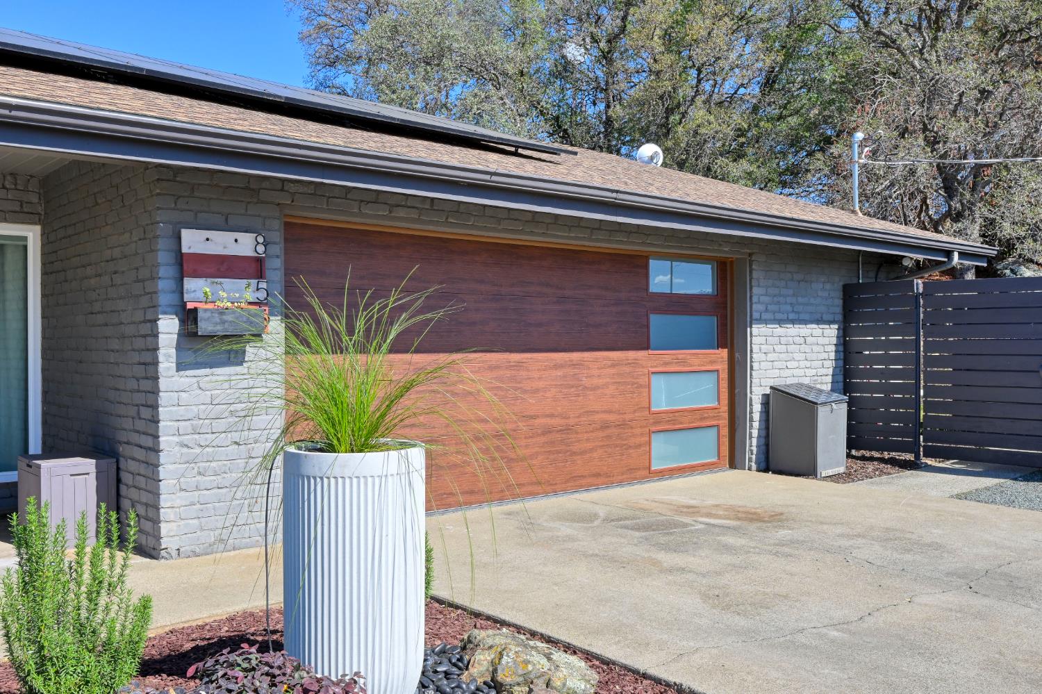 8155 Hubbard Road Auburn, CA 95602 - Photo 64 of 74 a front view of a house with a yard and garage