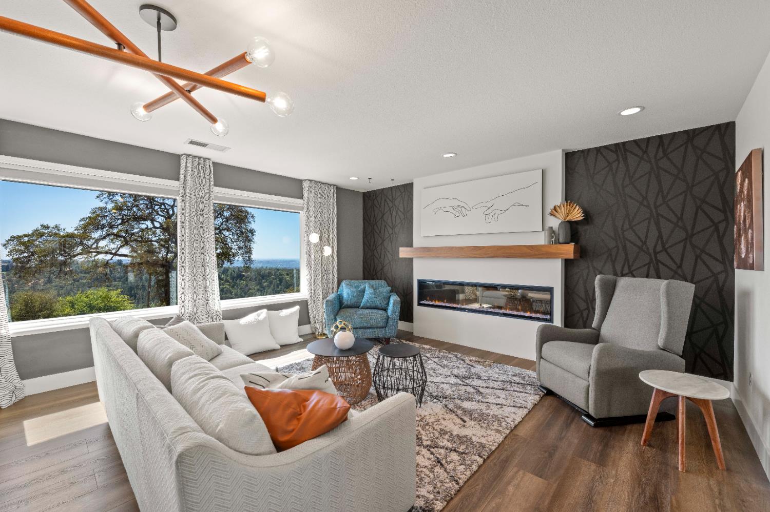 8155 Hubbard Road Auburn, CA 95602 - Photo 8 of 74 a living room with fireplace furniture and a large window
