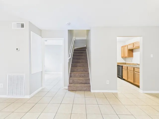 an empty room with windows