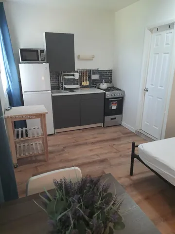 a room with furniture and a bed