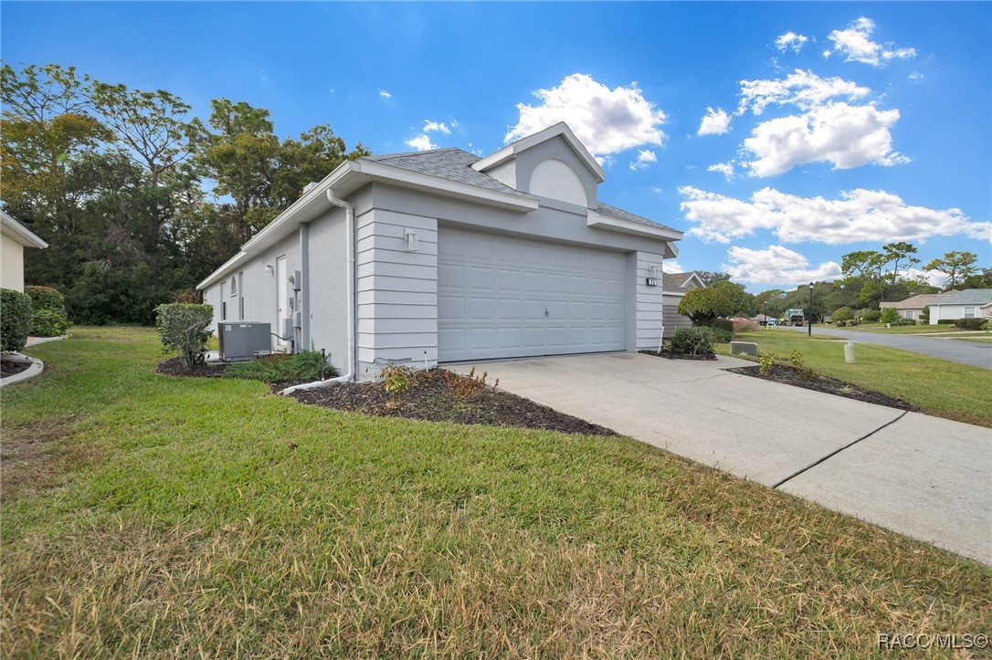 36 Byrsonima Loop Homosassa, FL 34446 - Photo 41 of 54 LEFT SIDE VIEW