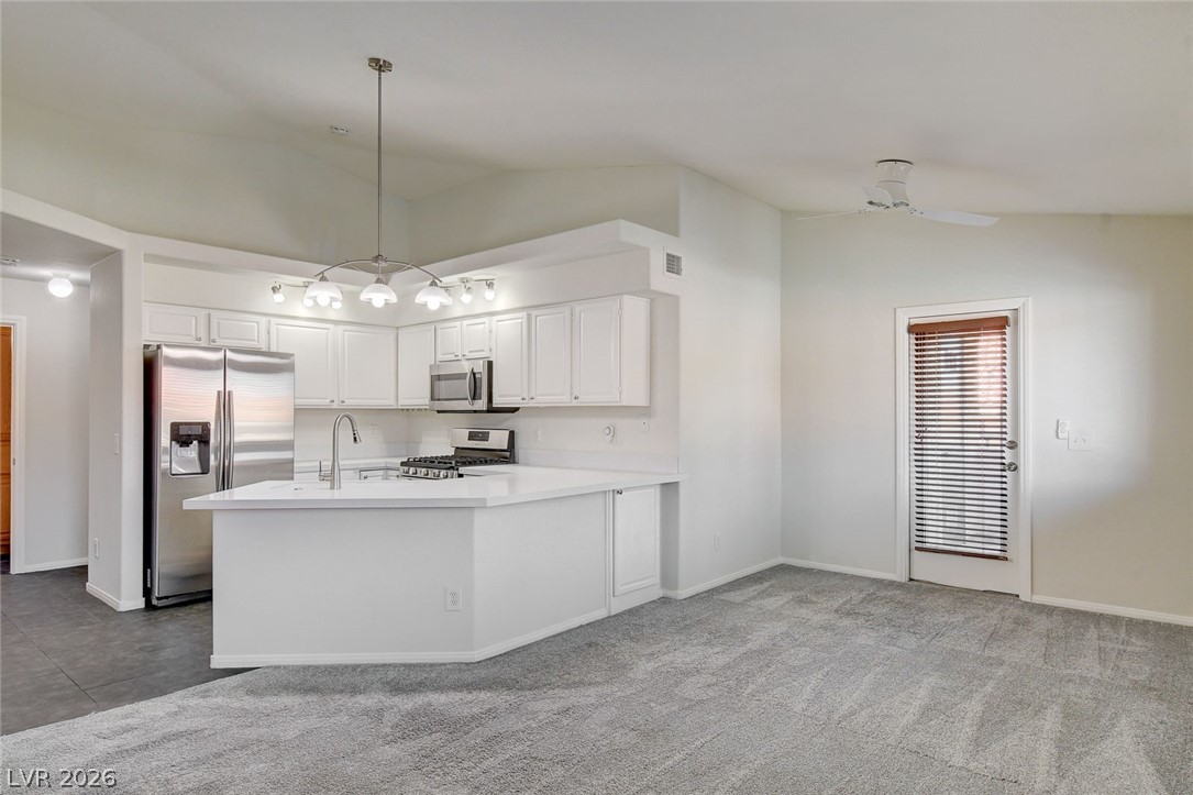 337 Manti Place, Unit 271 Henderson, NV 89014 - Photo 6 of 33 Great Room w/ Kitchen and Dining Area