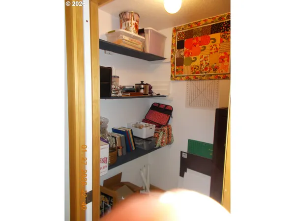 a en suite bathroom with a sink and mirror