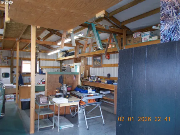 a view of a chairs and table in a room