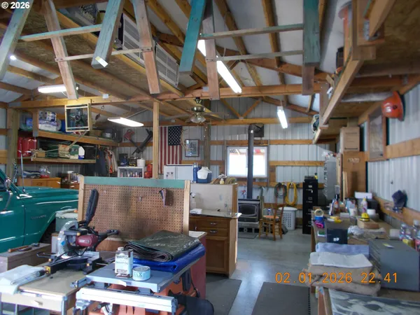 a room with lots of furniture and clutter