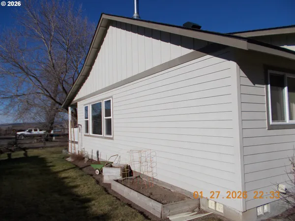 a backyard of a house with seating space