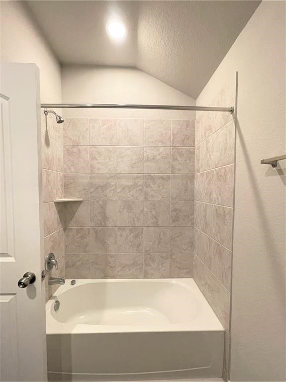 12118 Black Sage Court Conroe, TX 77304 - Photo 13 of 22 a bathroom with a bathtub and a shower