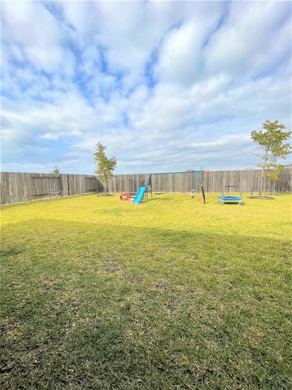 12118 Black Sage Court Conroe, TX 77304 - Photo 17 of 22 a view of an ocean and beach