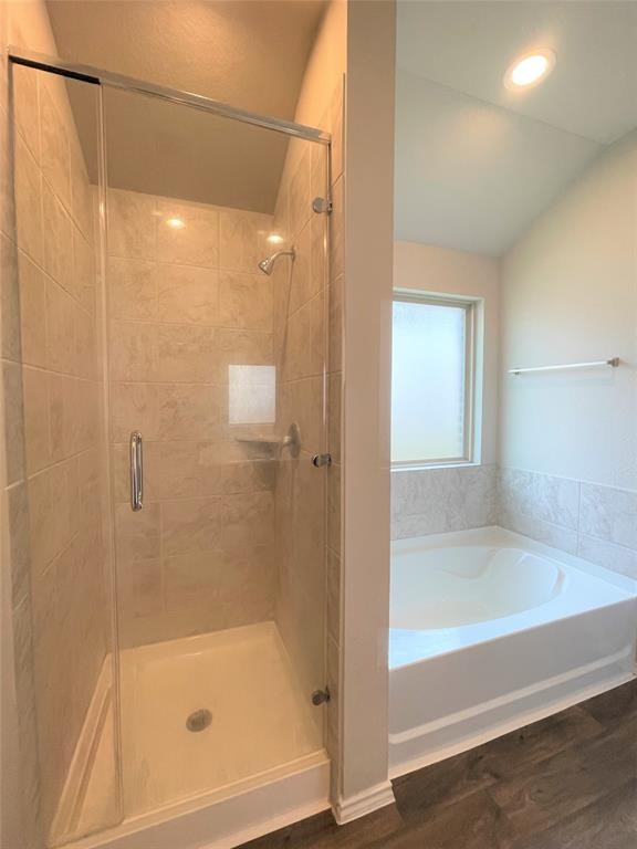 12118 Black Sage Court Conroe, TX 77304 - Photo 5 of 22 a bathroom with a glass shower door