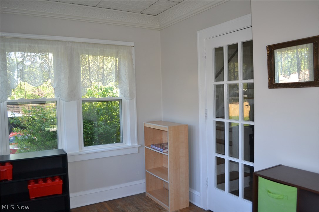 2125 Lorimer Road Cleveland, OH 44134 - Photo 12 of 18 Large sunroom located on side of home. Can be accessed from outdoor porch or living room.