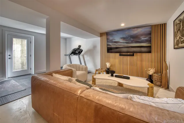 a living room with granite countertop furniture and a large window