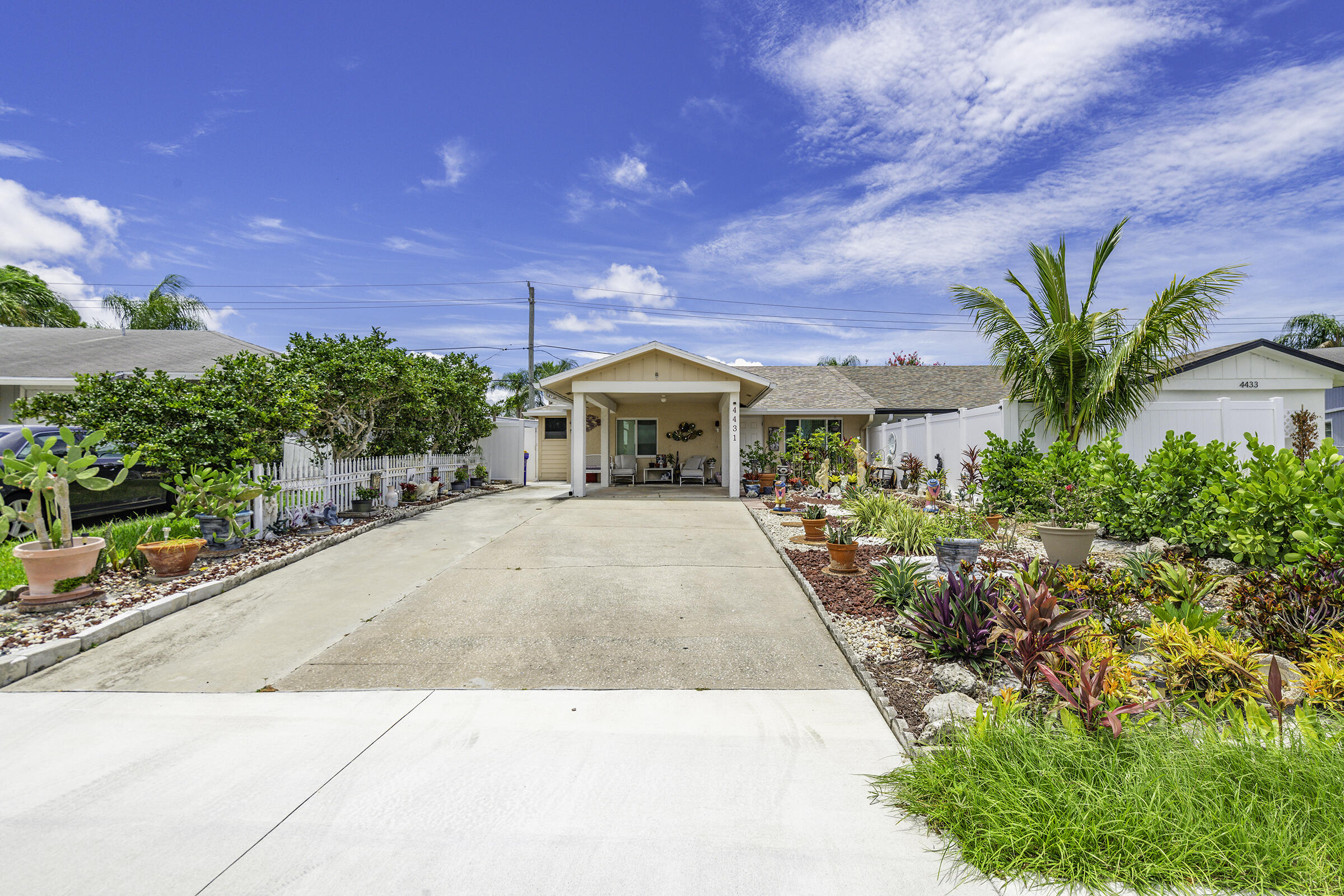 4431 Southeast Village Road Stuart, FL 34997 - Photo 2 of 24 Front