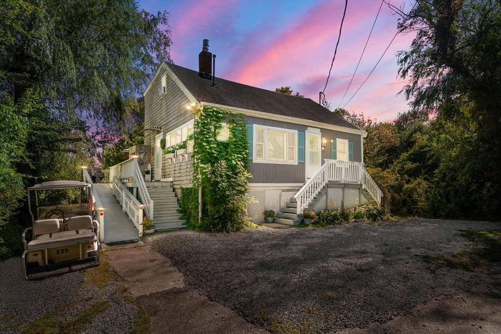 a view of a car park in front of house