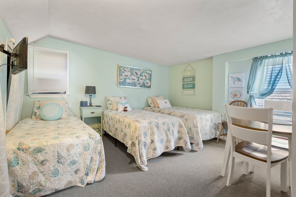 81 Constellation Road Marshfield, MA 02050 - Photo 17 of 42 a bedroom with two beds and painting on the wall