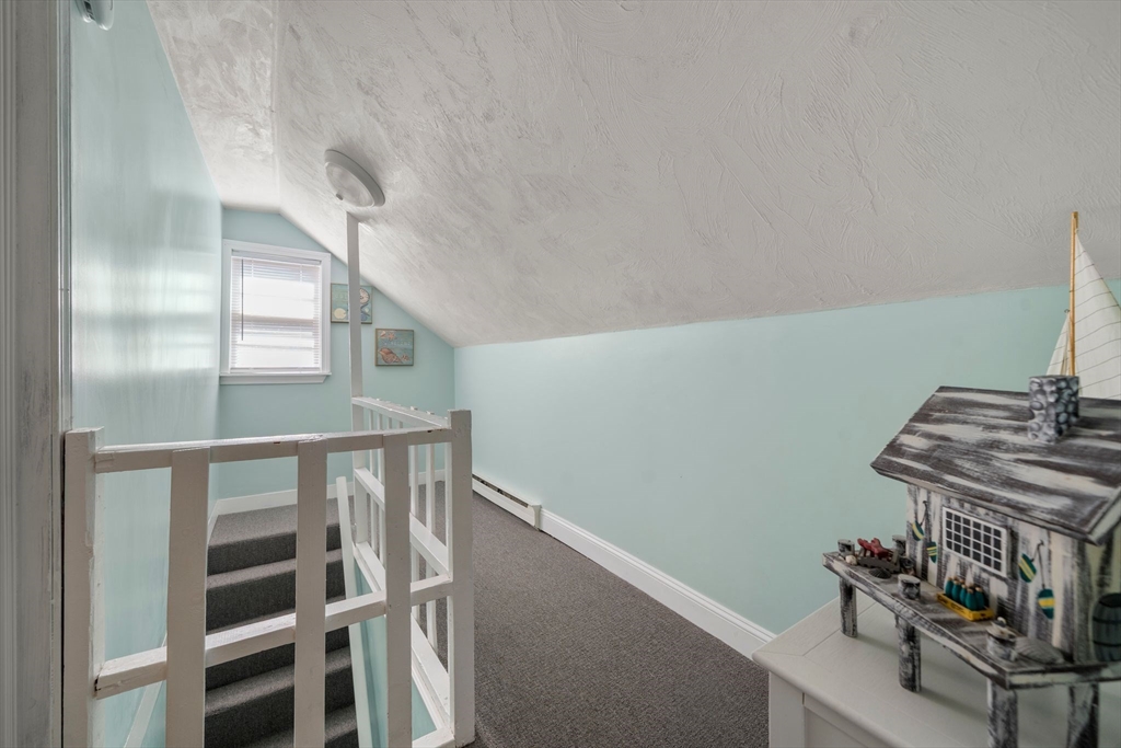 81 Constellation Road Marshfield, MA 02050 - Photo 18 of 42 a view of entryway with wooden floor