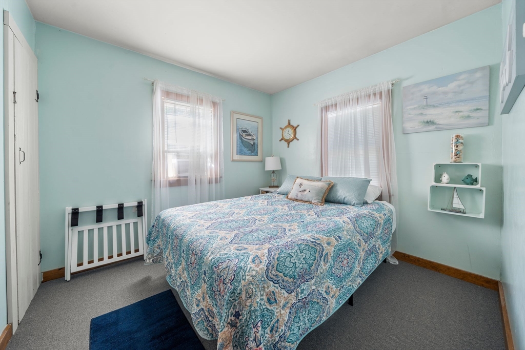 81 Constellation Road Marshfield, MA 02050 - Photo 2 of 42 a bedroom with a bed and a window
