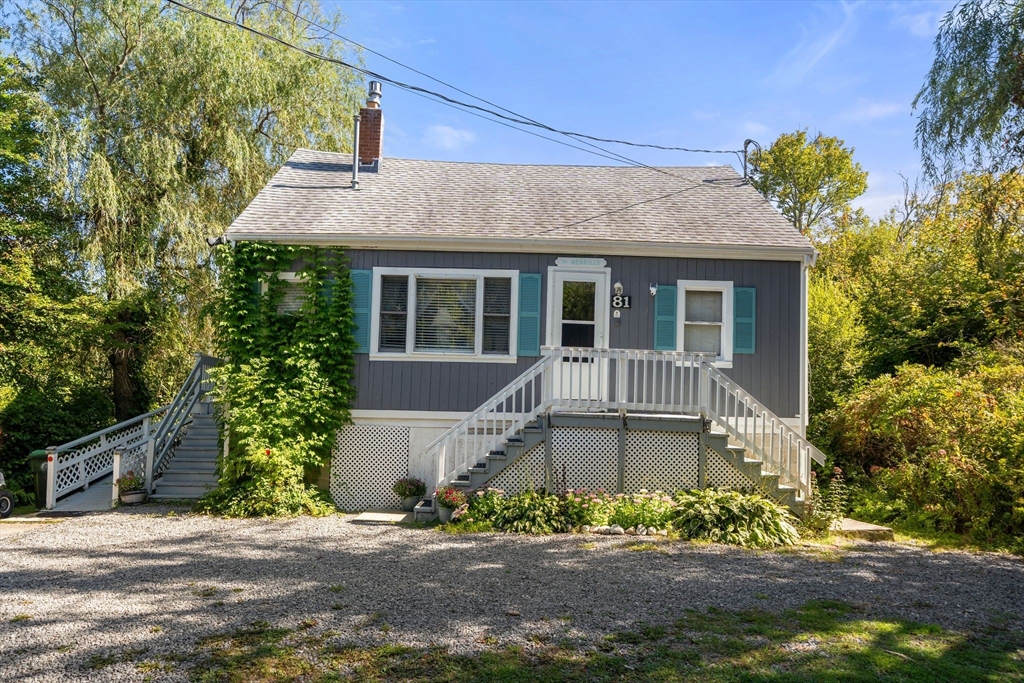 81 Constellation Road Marshfield, MA 02050 - Photo 22 of 42 a front view of a house with a yard
