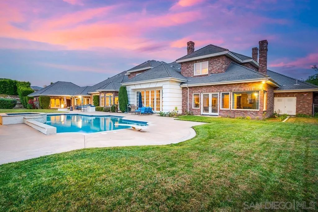 13752 Paseo Valle Alto Poway, CA 92064 - Photo 11 of 73 a front view of a house with garden and yard