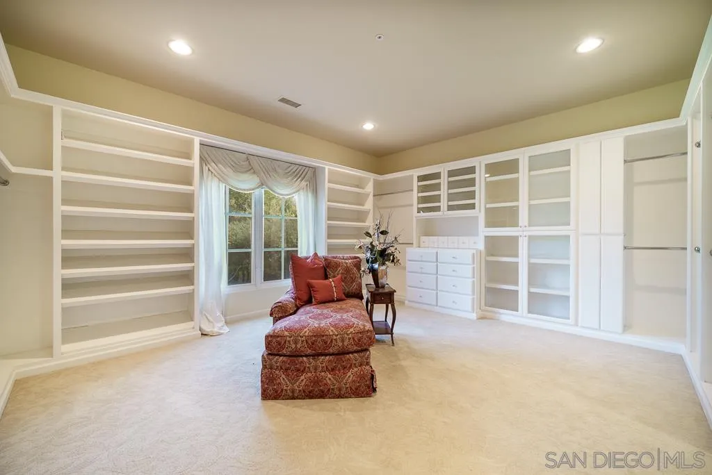 13752 Paseo Valle Alto Poway, CA 92064 - Photo 27 of 73 a living room with furniture and a large window