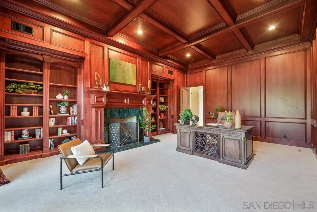 13752 Paseo Valle Alto Poway, CA 92064 - Photo 28 of 73 a living room with furniture a fireplace and a large window