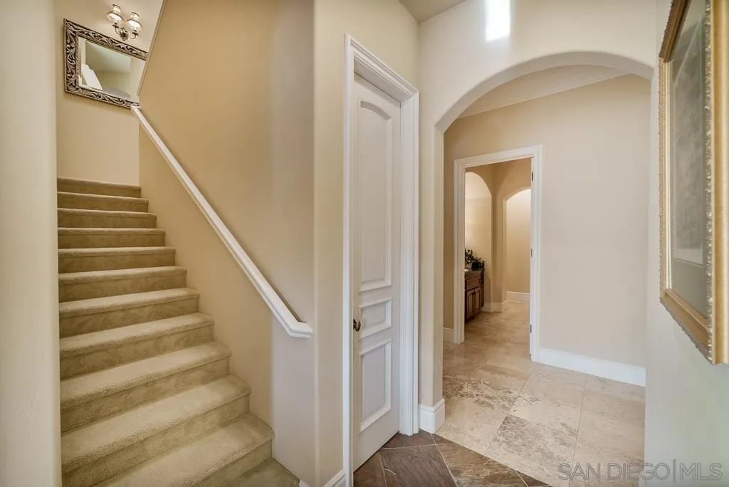 13752 Paseo Valle Alto Poway, CA 92064 - Photo 39 of 73 a view of a hallway with wooden floor and entryway