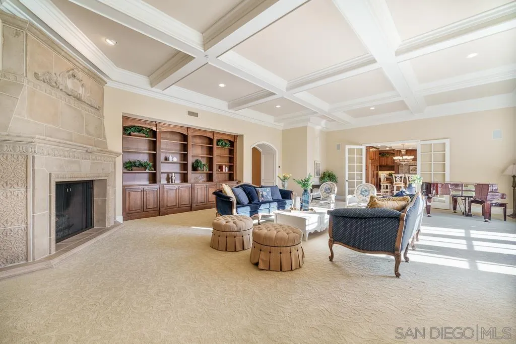 13752 Paseo Valle Alto Poway, CA 92064 - Photo 41 of 73 a living room with furniture and a fireplace