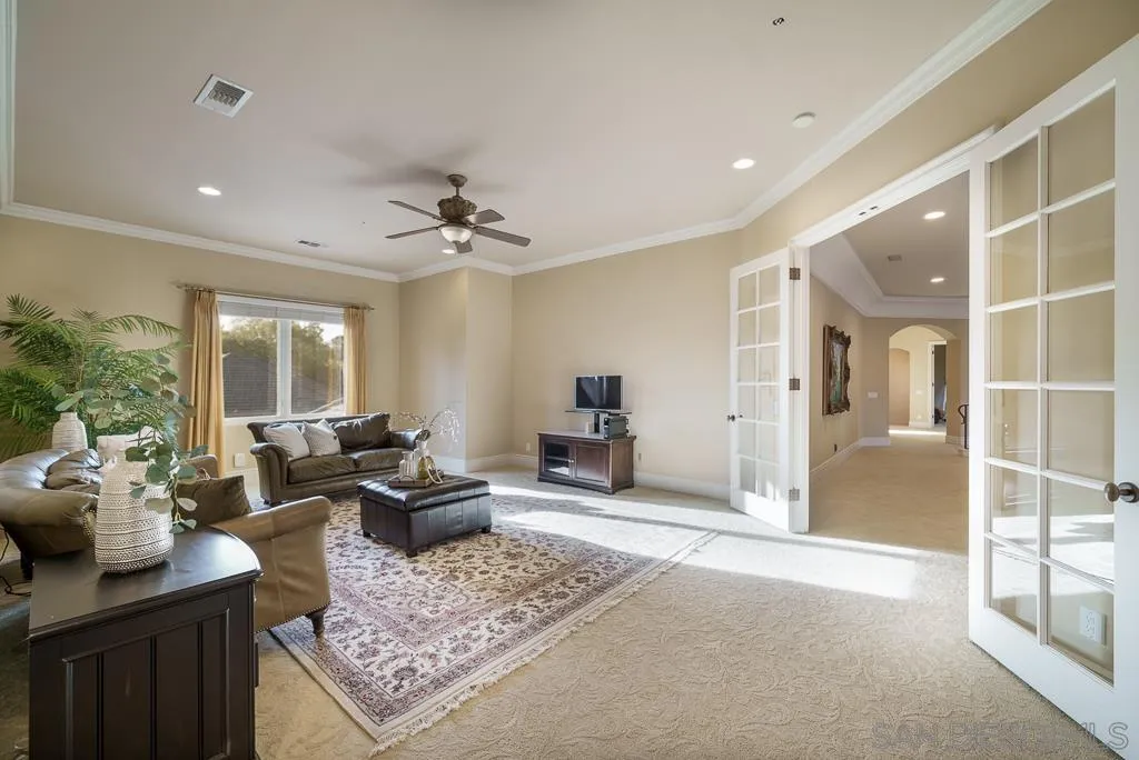 13752 Paseo Valle Alto Poway, CA 92064 - Photo 47 of 73 a living room with furniture and a large window
