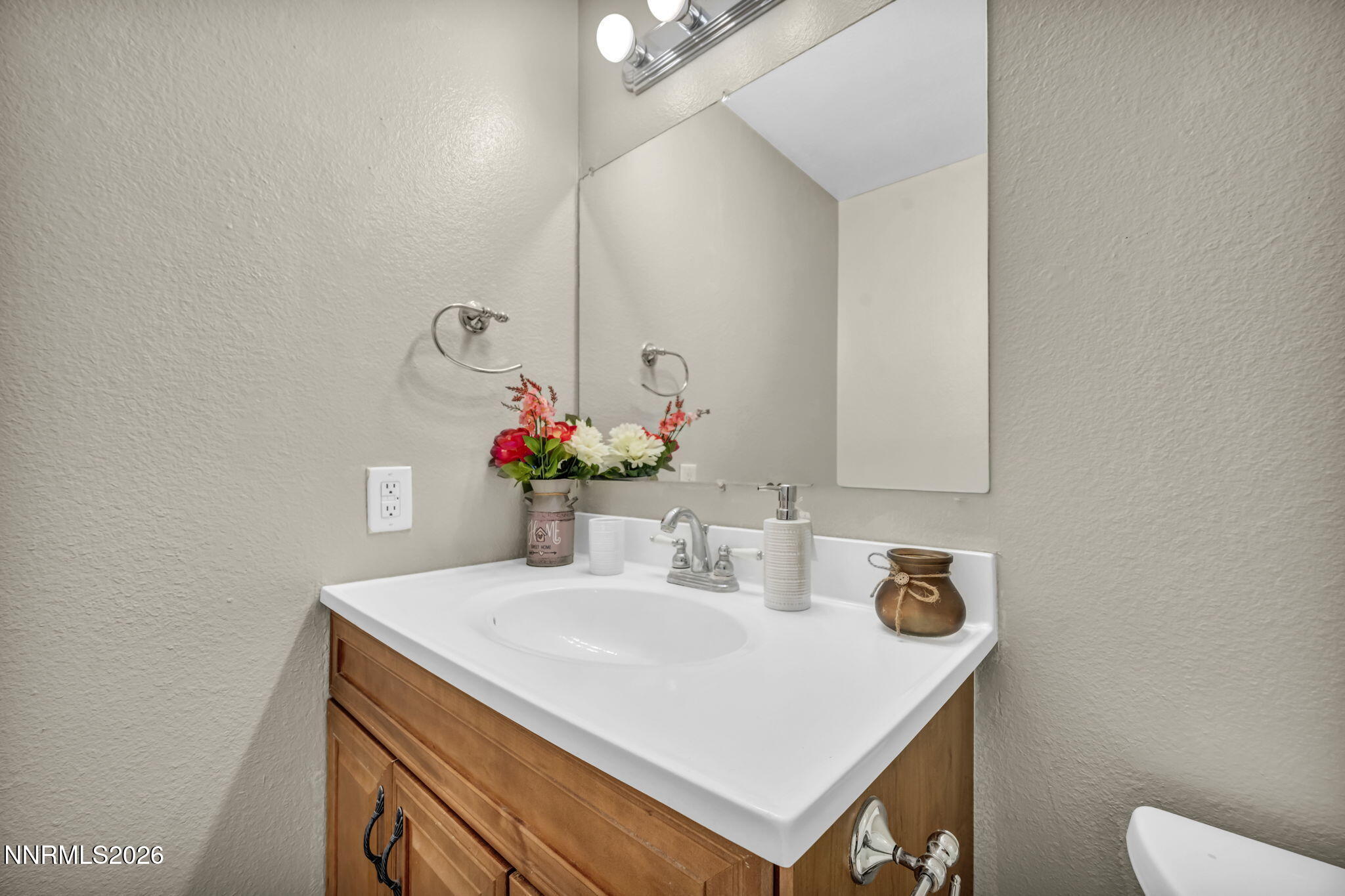 19 Condor Circle Carson City, NV 89701 - Photo 24 of 41 a bathroom with a sink and a mirror