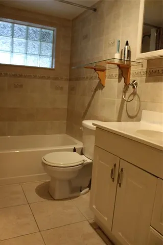 a bathroom with a toilet and a sink