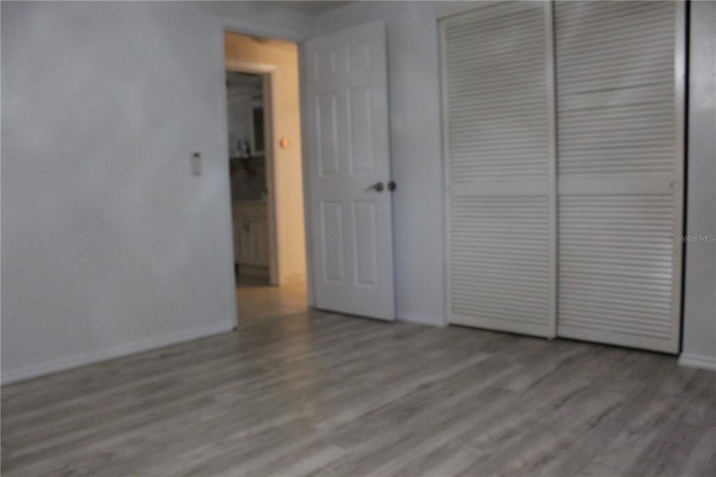 5128 Dove Drive New Port Richey, FL 34652 - Photo 10 of 23 a view of a room with wooden floor