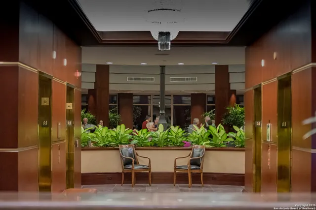 a view of a chair and table in a patio