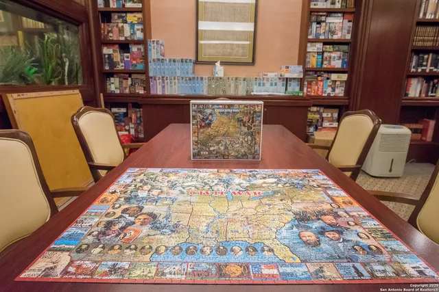 a dining room with rug rug and wooden floor